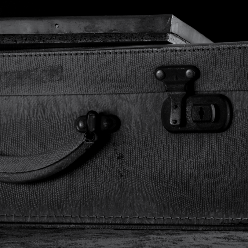 Black and white photo: Suitcase